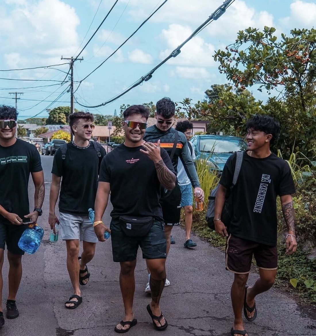 Valor team walking together on Oahu's North Shore in Alder gear